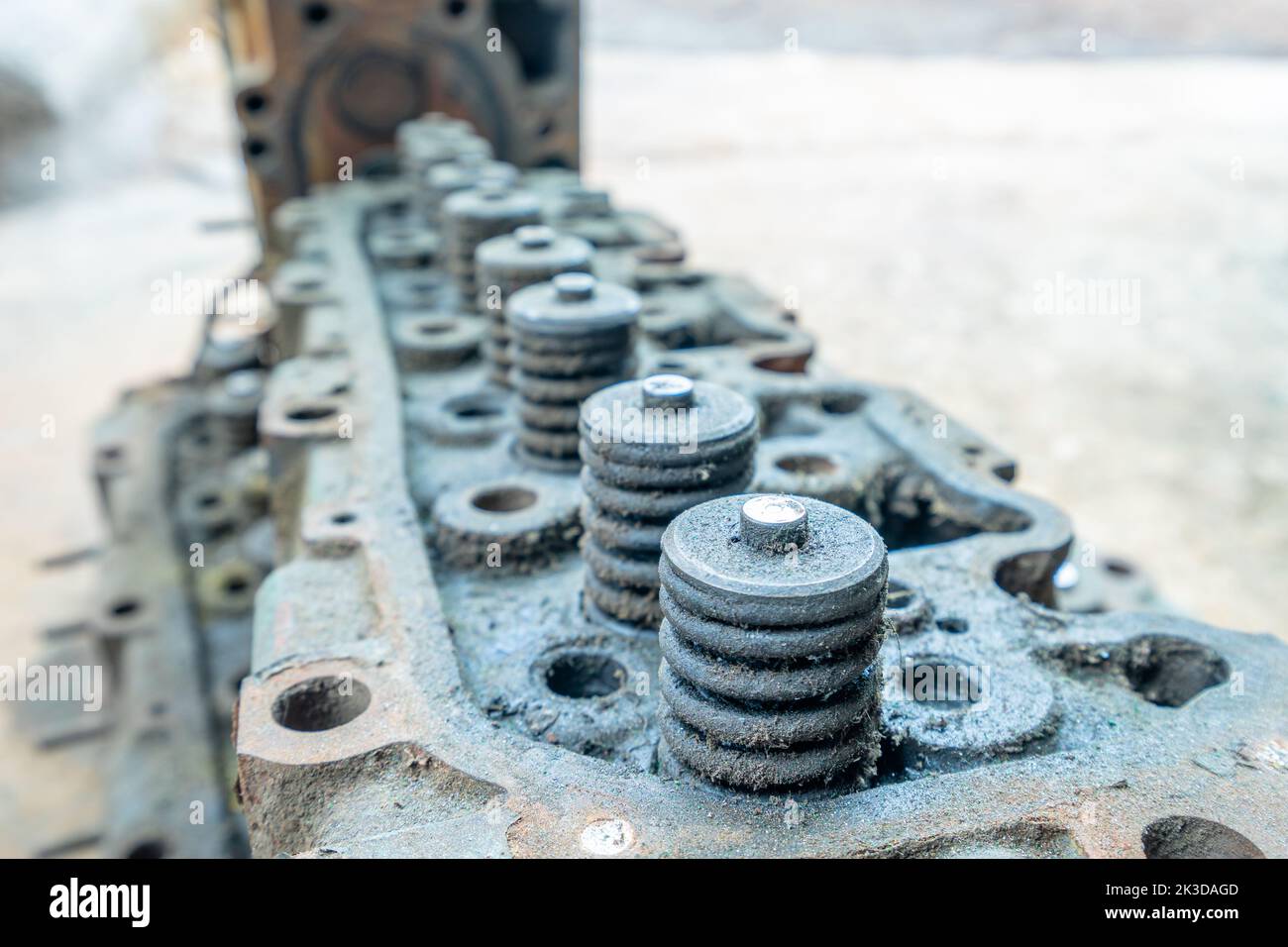 Old oil stains on pistons in the eight engine blocks or called cylinder block used for vessel boat. Stock Photo