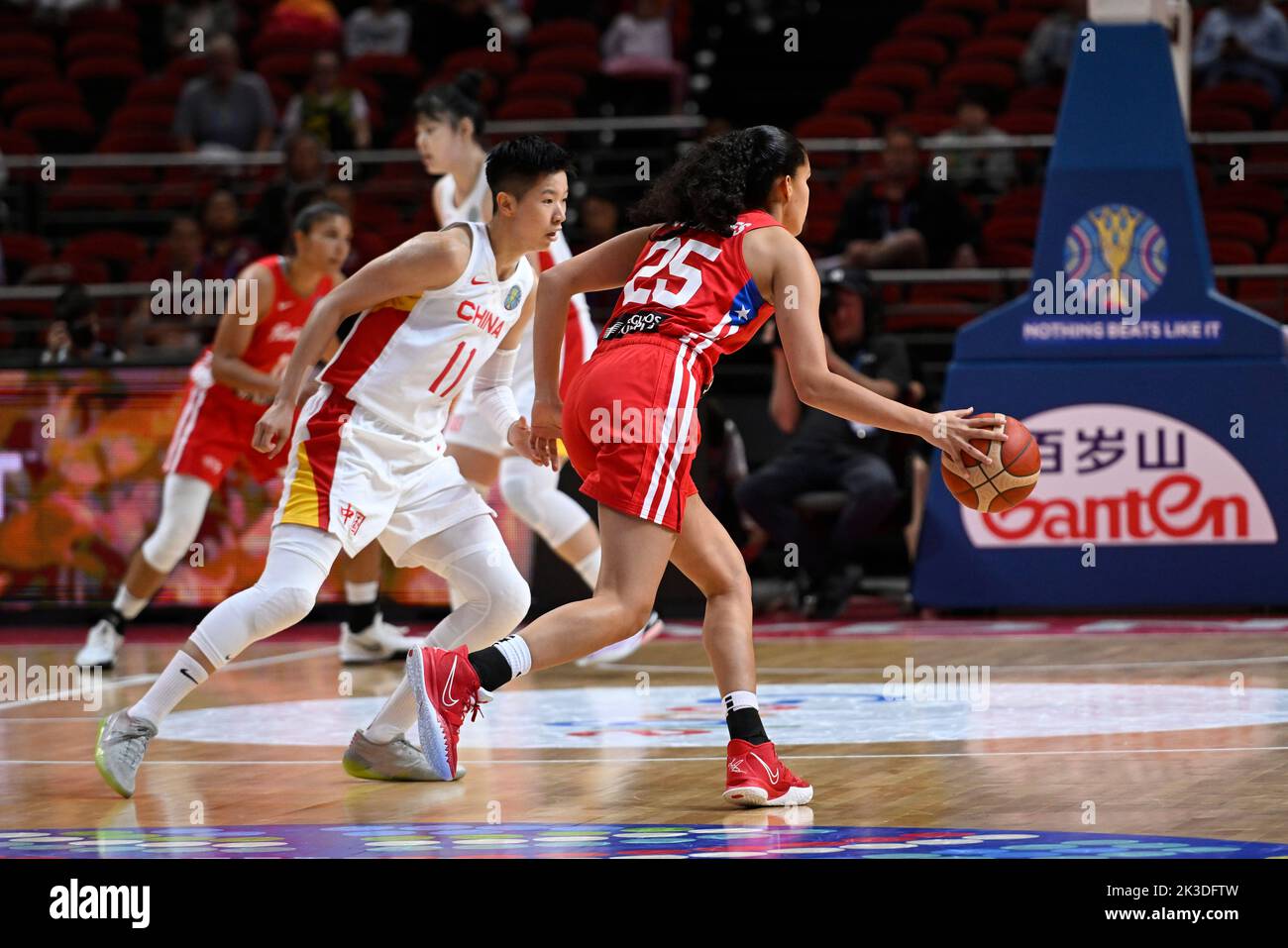 26th September 2022;  Sydney, Homebush, New South Wales, Australia, Women's World Cup Basketball, China versus Puerto Rico; Isalys Quinones of Puerto Rico dribbles the ball down the court past Sijing Huang of China Stock Photo