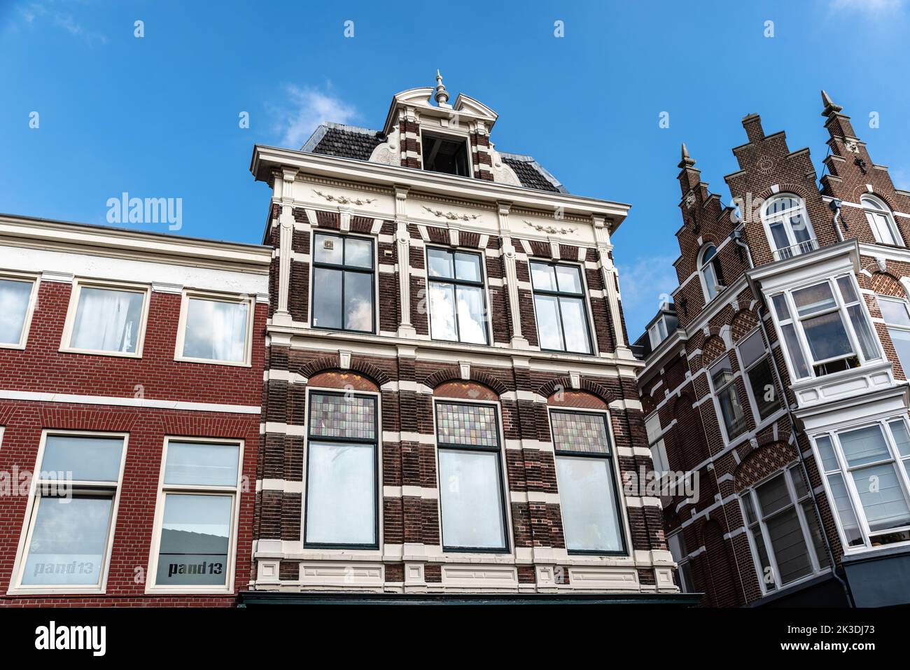 Haarlem, Netherlands - May 07,2022: Low angle view of traditional Dutch houses in historic centre Stock Photo
