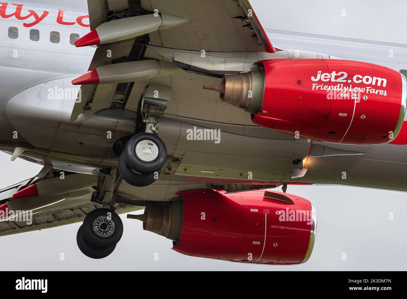 Jet2 Boeing 737 in the air landing with wheels down. Stock Photo