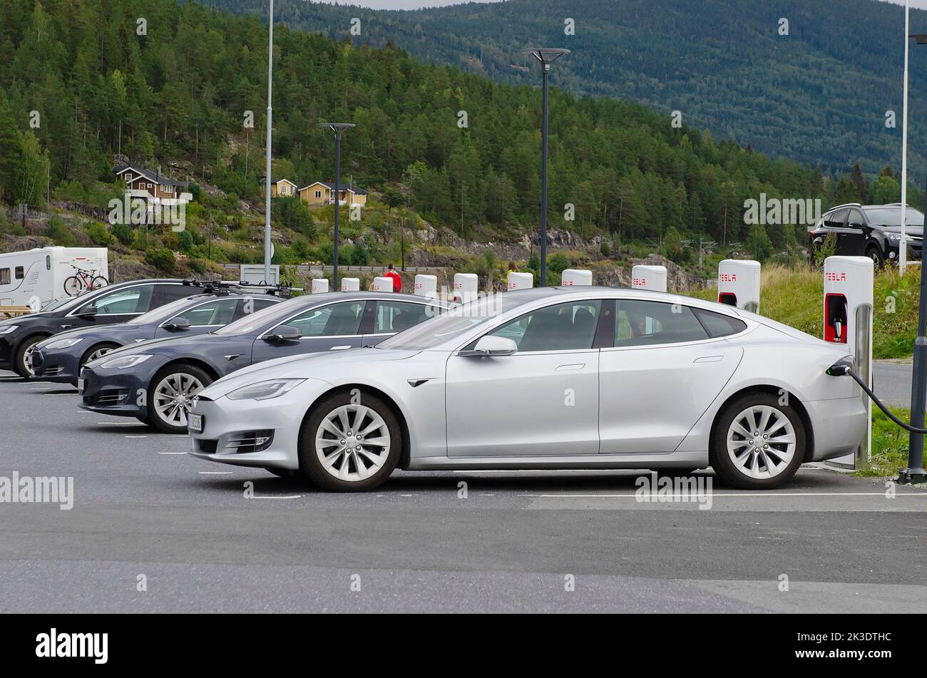 Norway-, Tesla vehicles being recharged at a Tesla charging station ...