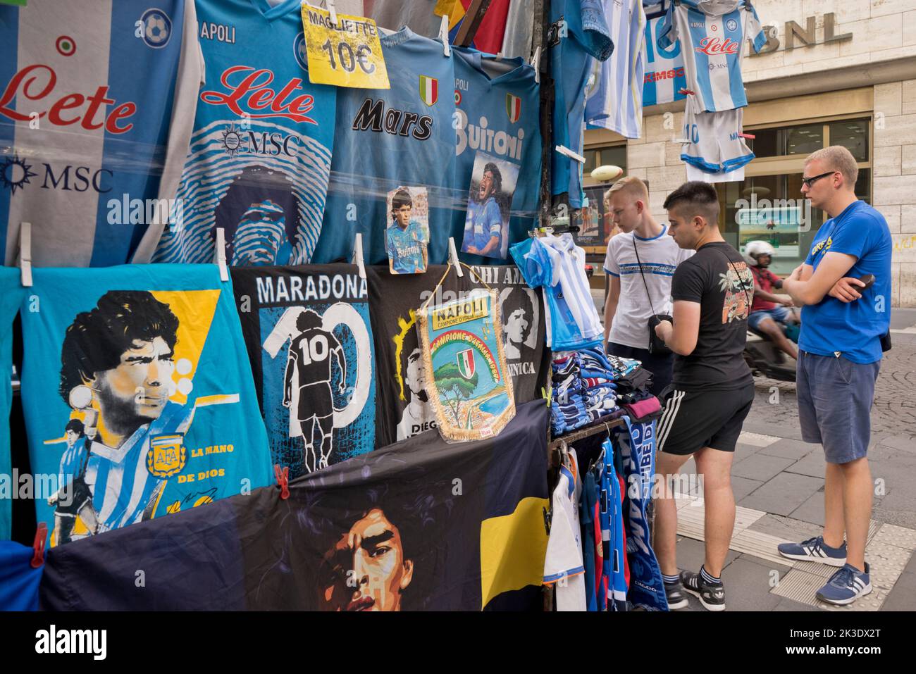 Shirts and memorabilia stall in memory of the late famous Argentinian football star Diego Maradona in Naples, where he won the serie A Italian champon Stock Photo