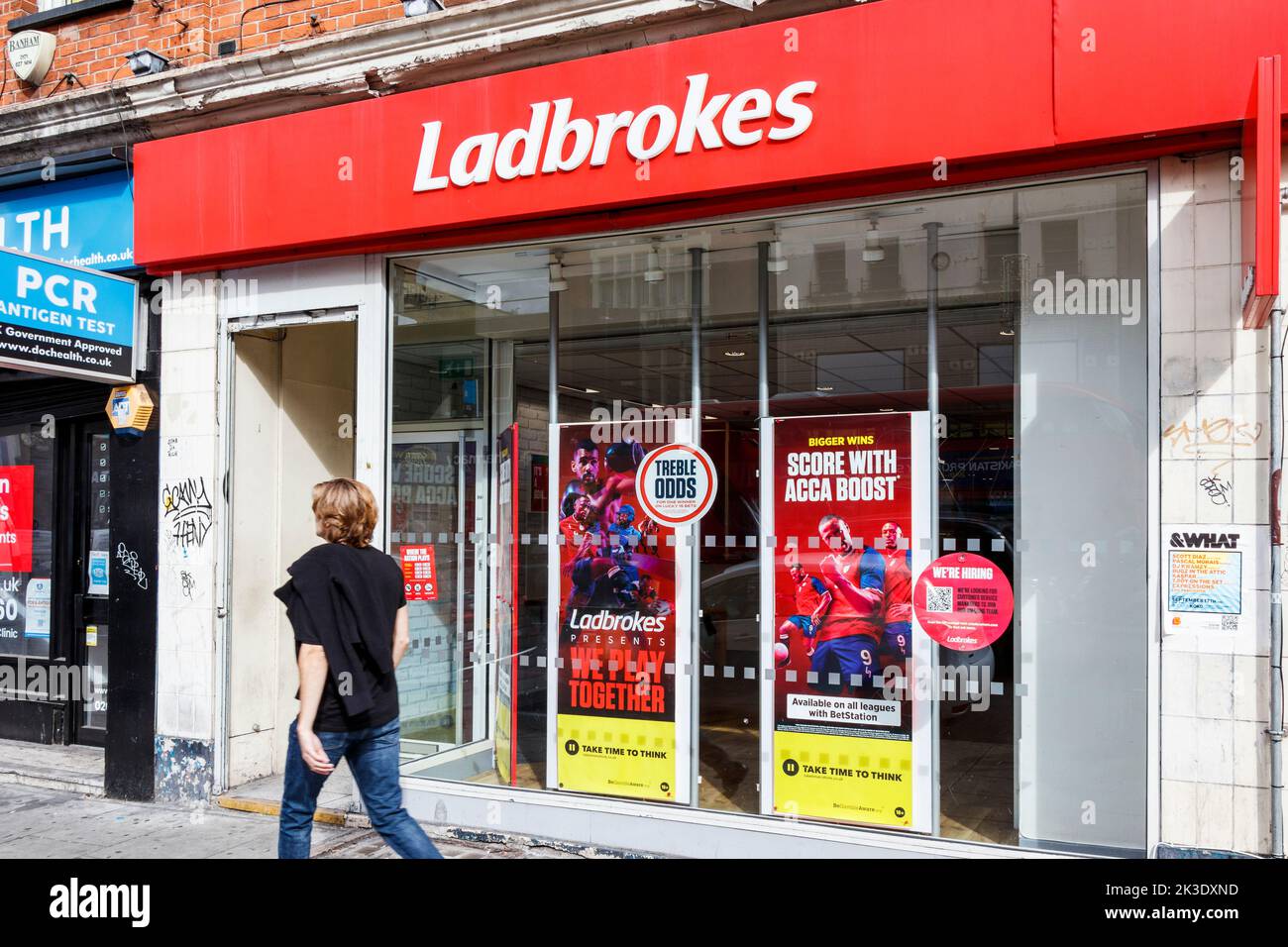A branch of Ladbrokes betting shop on Camden High Street, London, UK Stock Photo