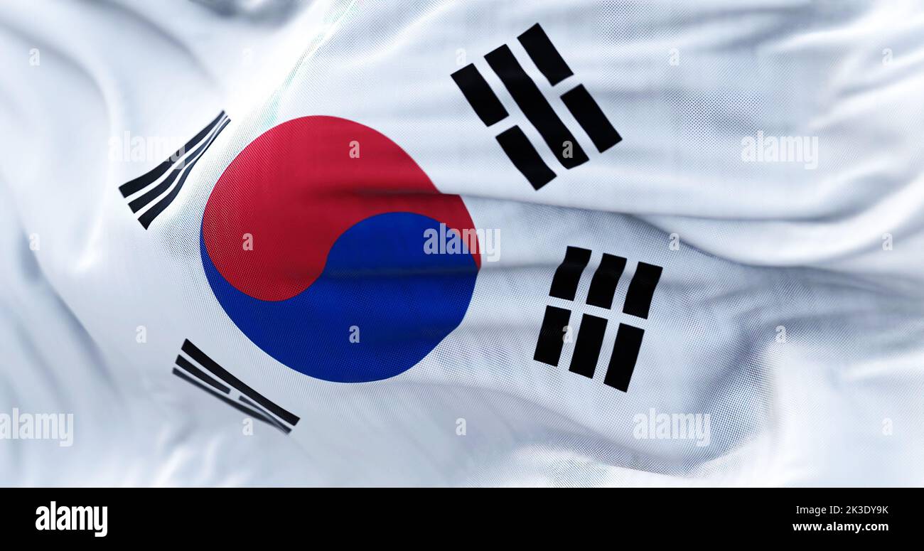 Close-up view of the South Korea national flag waving in the wind. The Republic of Korea is a country in East Asia. Fabric textured background. Select Stock Photo