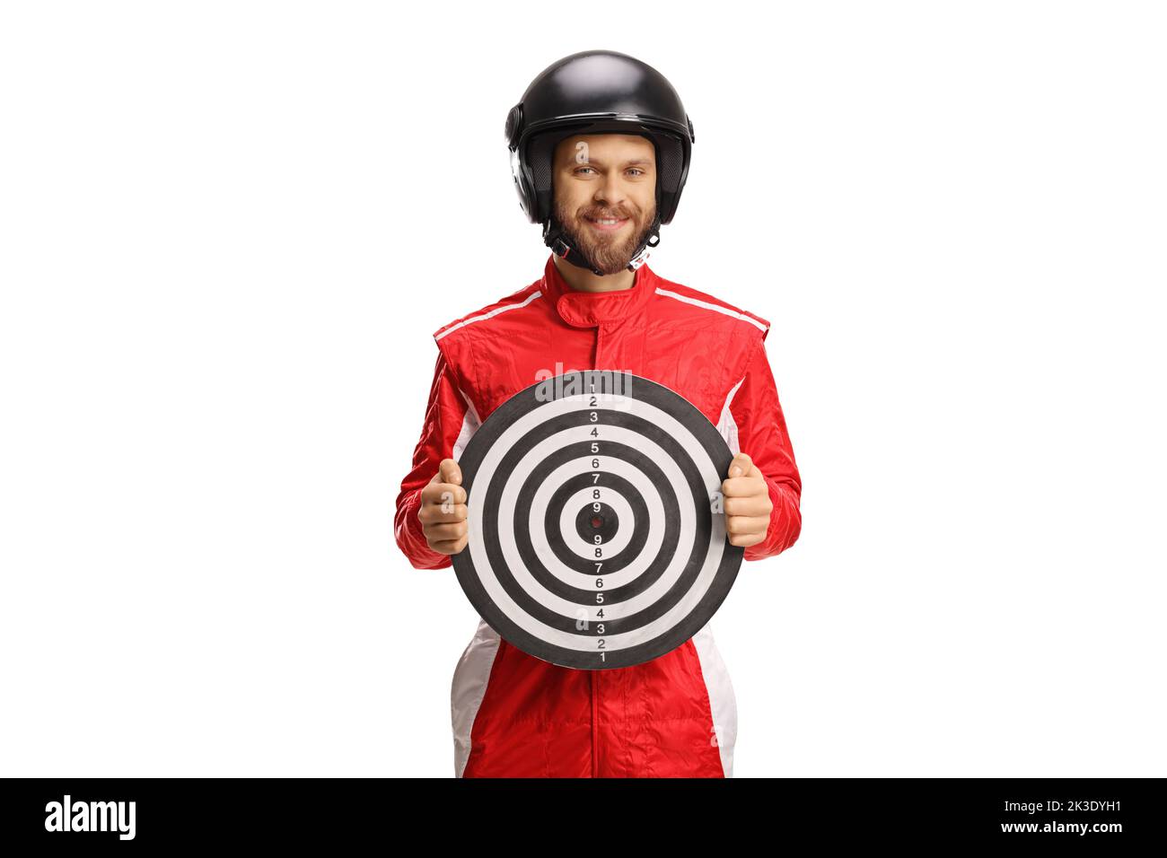 Motorsport racer in a red suit holding a target for darts isolated on white background Stock Photo