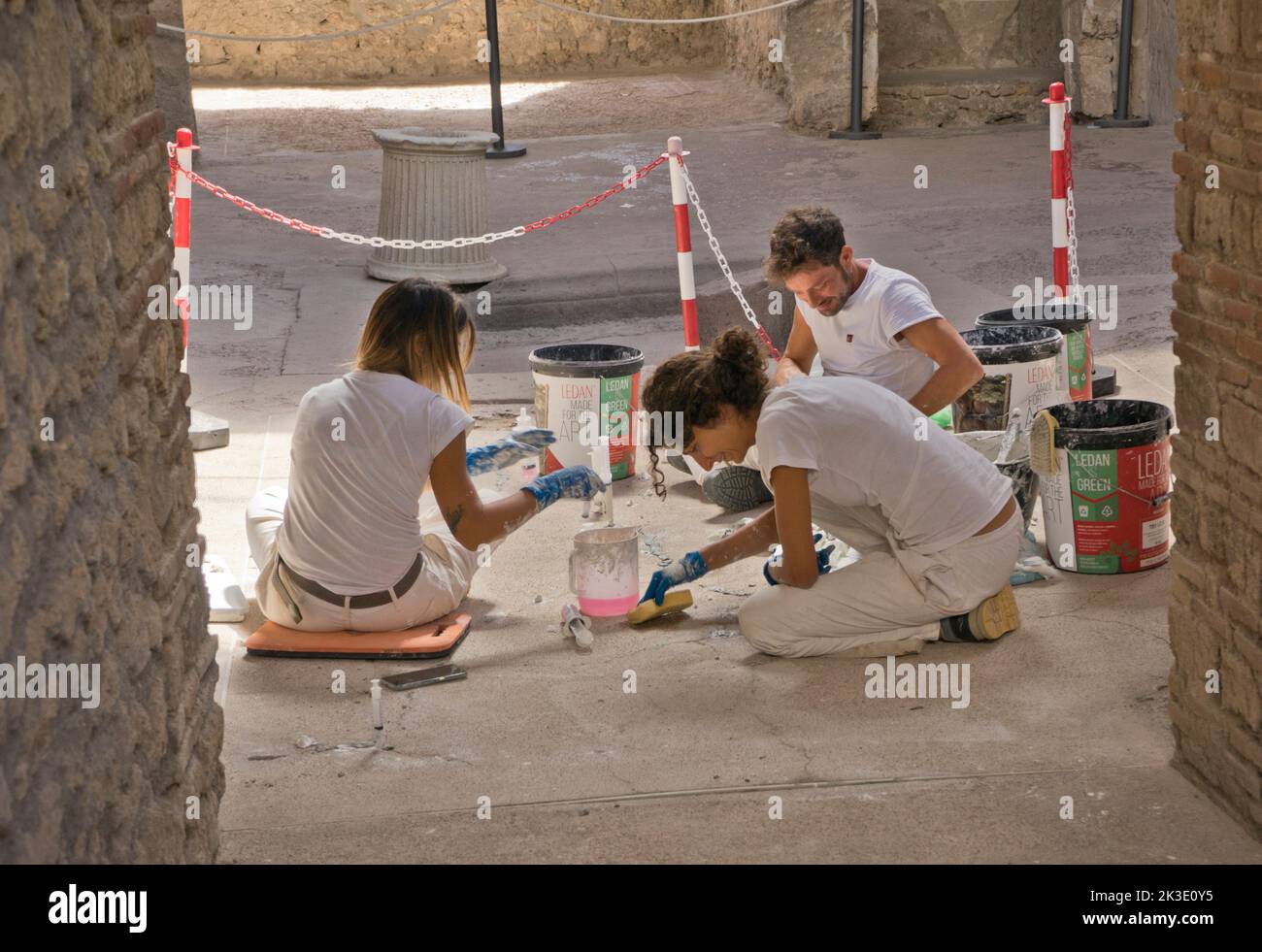 Workers doing restoration of Pompeii archaelogical site near Naples,Italy Stock Photo