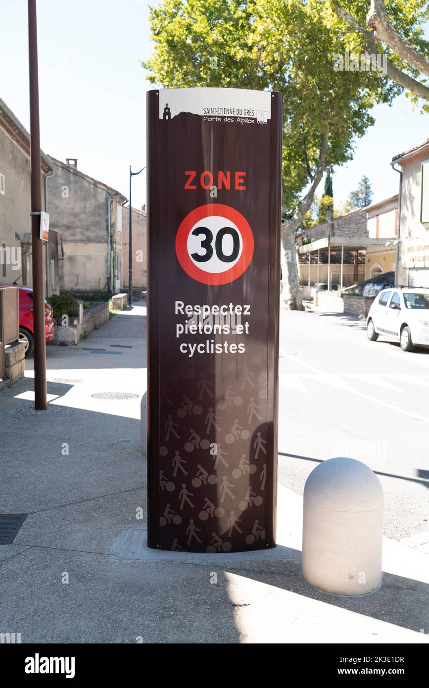 Signs in the French village of Saint-Étienne-du-Grès, Provence, to aid traffic calming measures and the priority of pedestrians and cyclists. Stock Photo