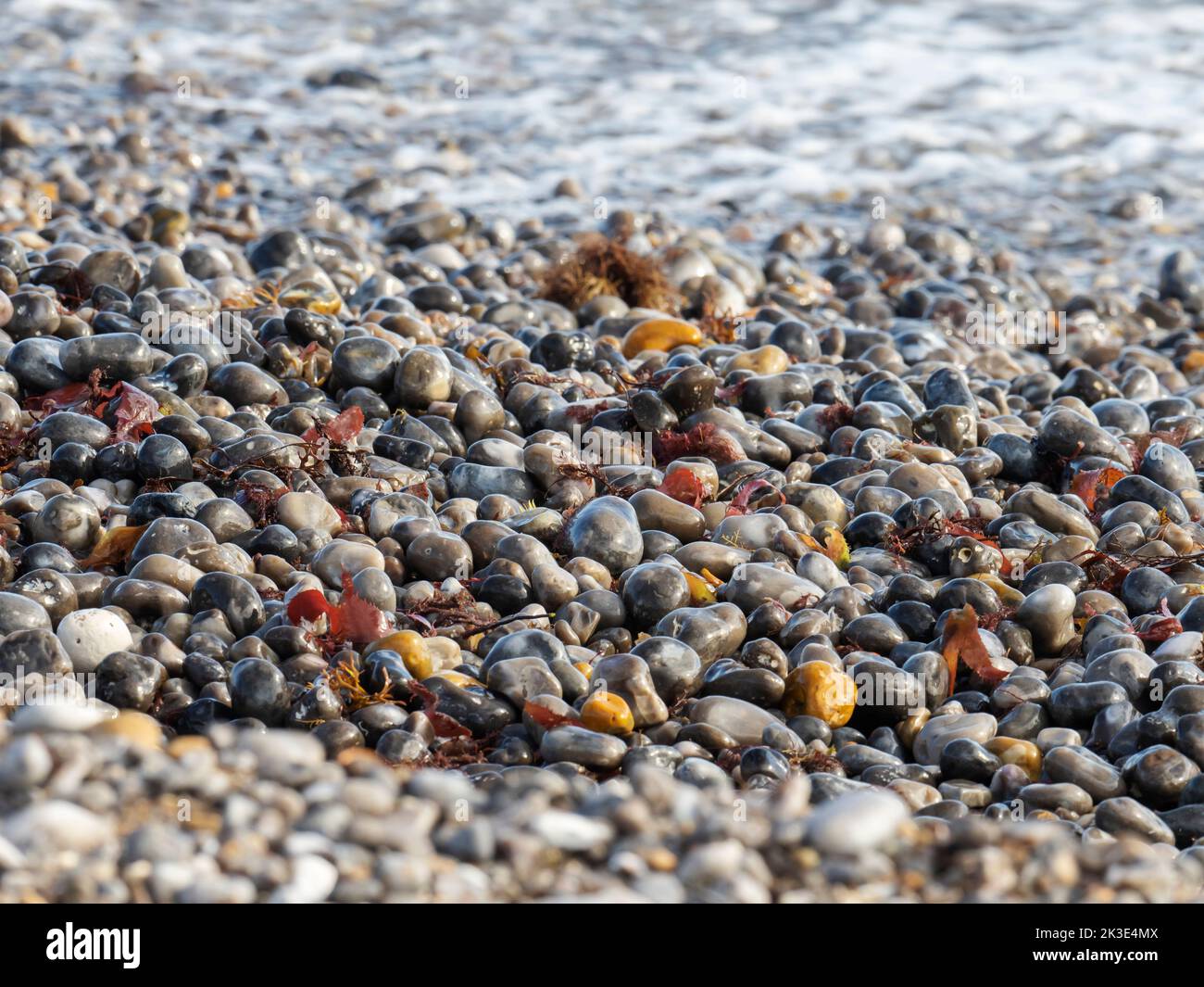 Smoothed pebbles on the beach in Freshwater on the Isle of White, UK. Stock Photo