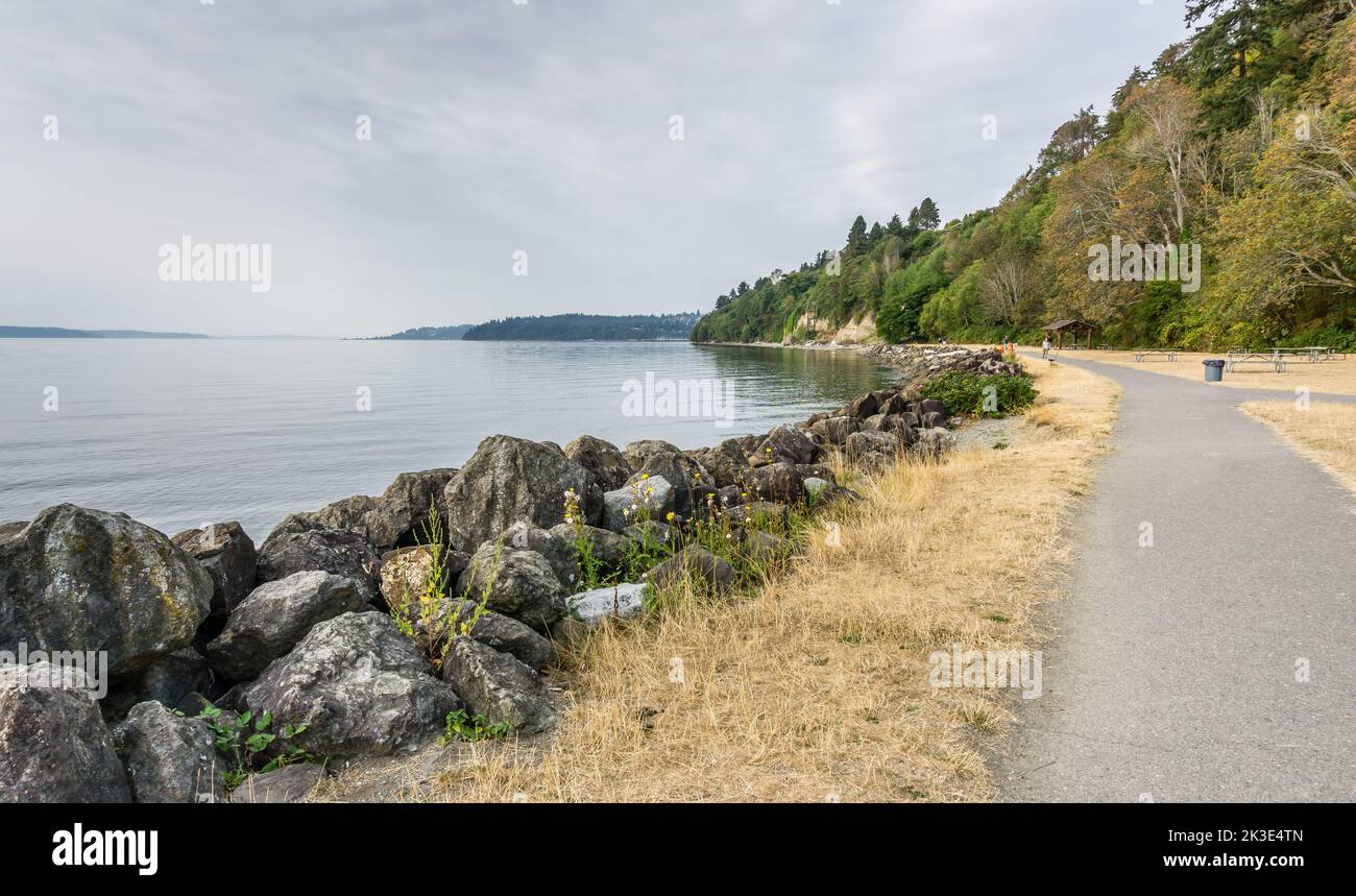 Smooth water in the Puget Sound near the shoreline in Des Moines, Washington. Stock Photo