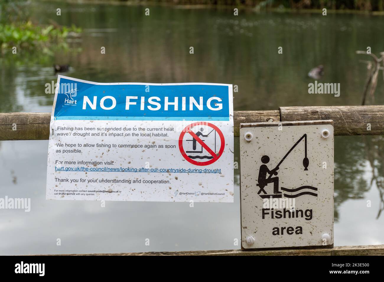 No fishing sign at a fishing area at Fleet Pond in summer 2022 due to low water levels caused by drought and heatwaves, Hampshire, England, UK Stock Photo