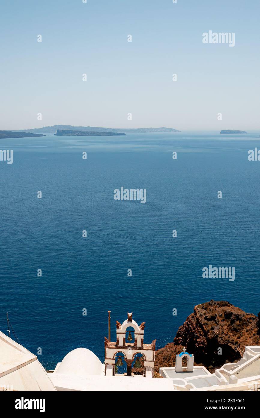 A typical white bell tower on Santorini. Stock Photo