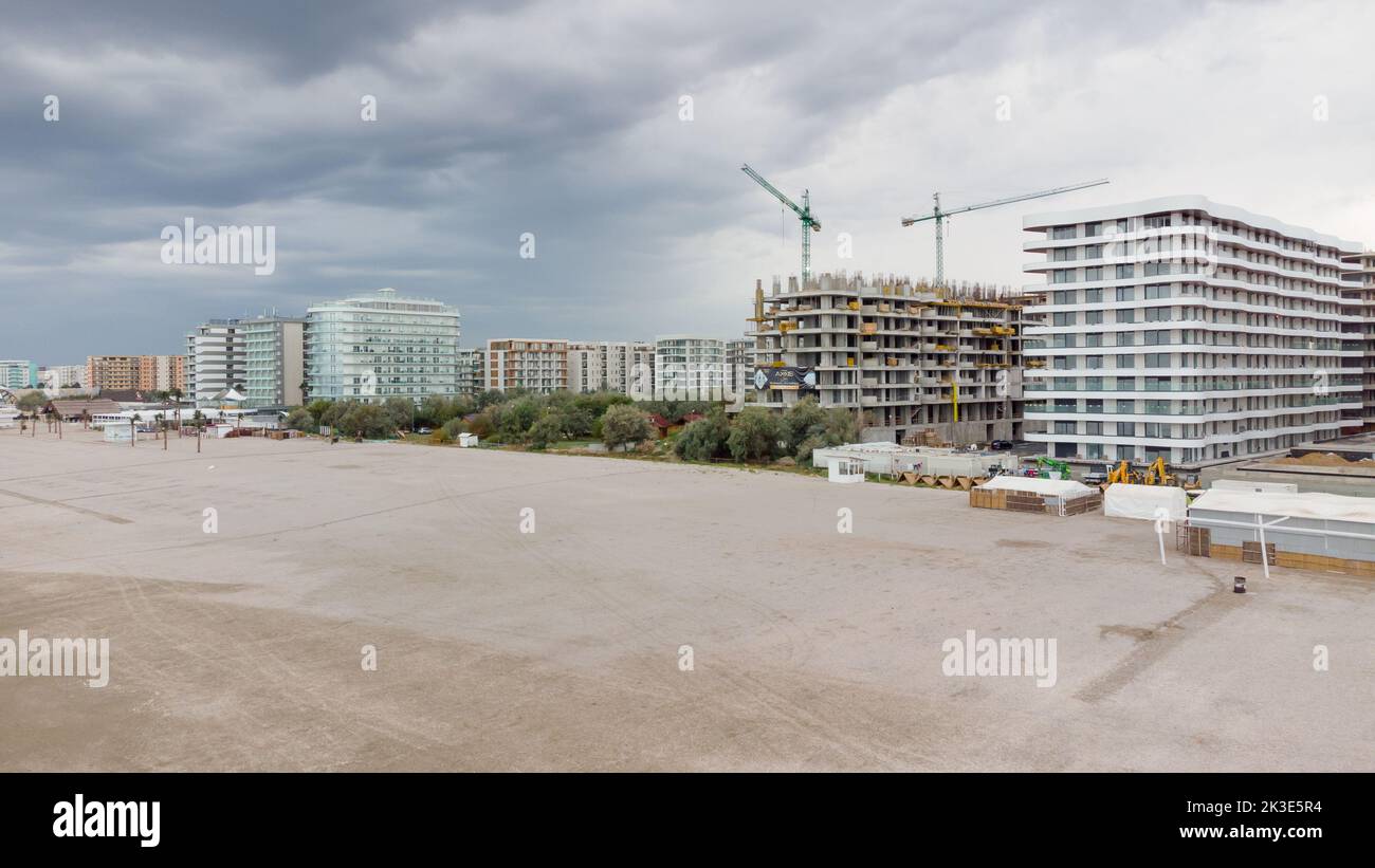 Mamaia beach, Constanta, Romania - September 17, 2022 Drone view of the hotel buildings under construction from the developer company AXXIS Nova Resor Stock Photo