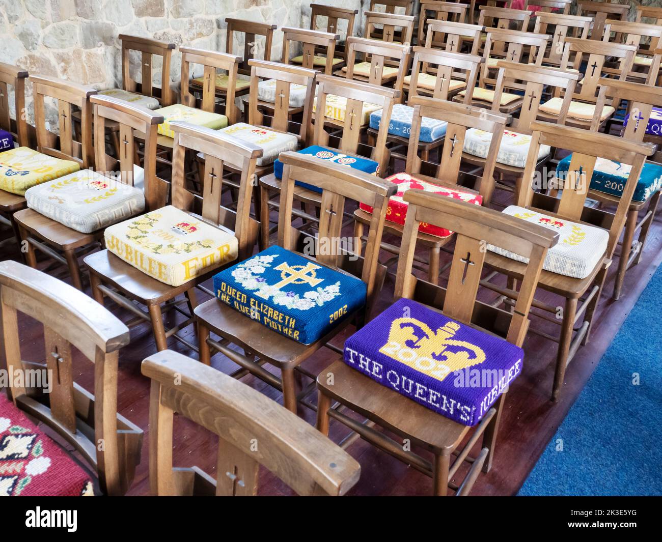 Kneelers on chairs in a church in Freshwater on the Isle of White, UK. Stock Photo