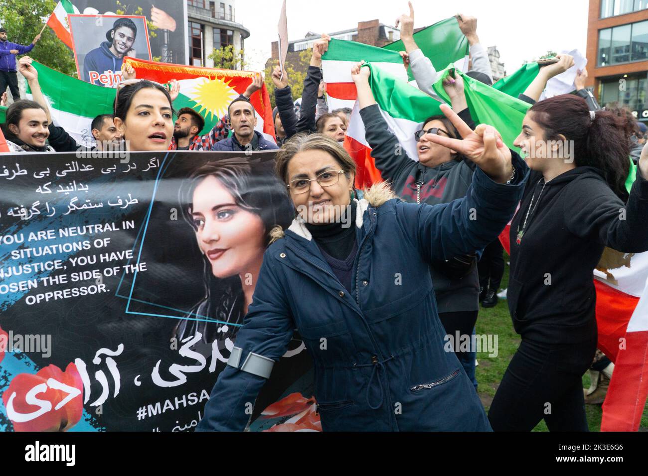 Manchester, UK, 25 Septemb3er 2022: At Picadilly Gardens in Manchester approximately two hundred Iranian expatriates protested against the current Iranian government and called for regime change. Waving the old Iranian pre-Revolutionary flag, protestors chanted the name of Mahsa Amini who was recently killed by Iran's Revolutionary Guard for not covering her hair. Anna Watson/Alamy Live News Stock Photo