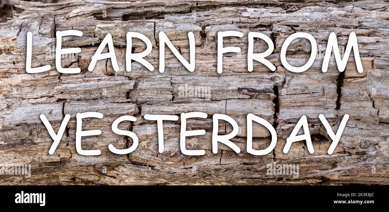 inspirational-motivational-quote-learn-from-yesterday-on-rotten-wood