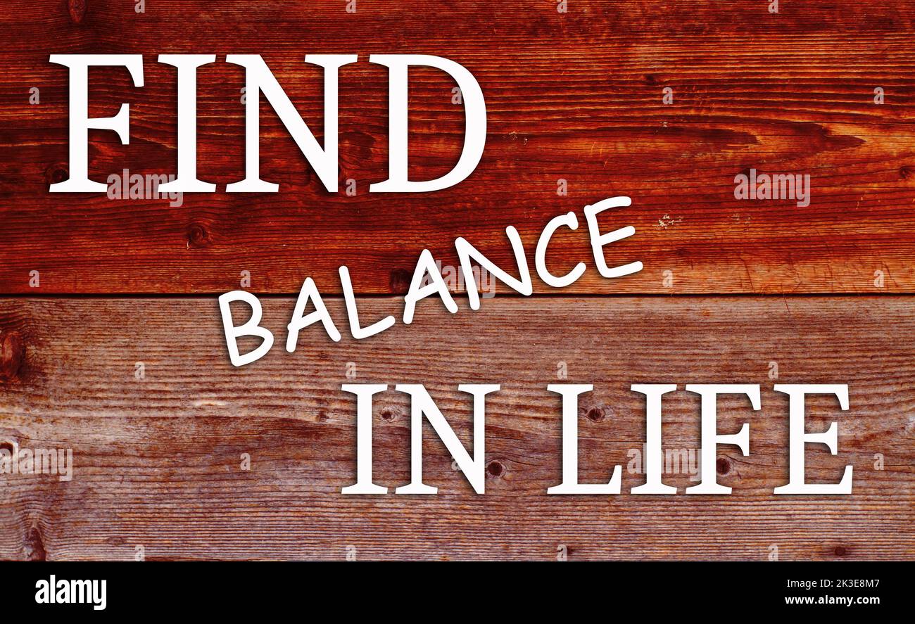 Inspirational motivational quote Find balance în life, on wooden background. Stock Photo