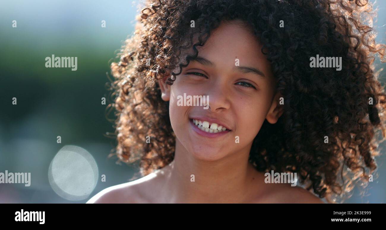 Black Preteen Girl Child Smiling At Camera Standing Outside African black-preteen-girl-child-smiling-at-camera-standing-outside-african