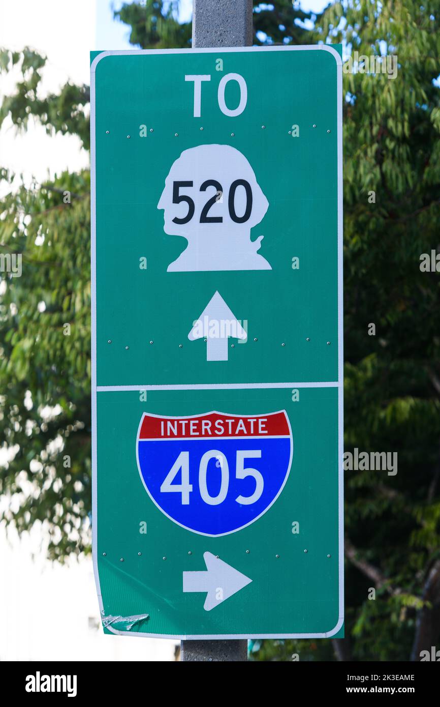 Bellevue, WA, USA - September 08, 2022; Traffic direction sign in Bellevue with arrows for Interstate 405 and Washington State route SR 520 Stock Photo