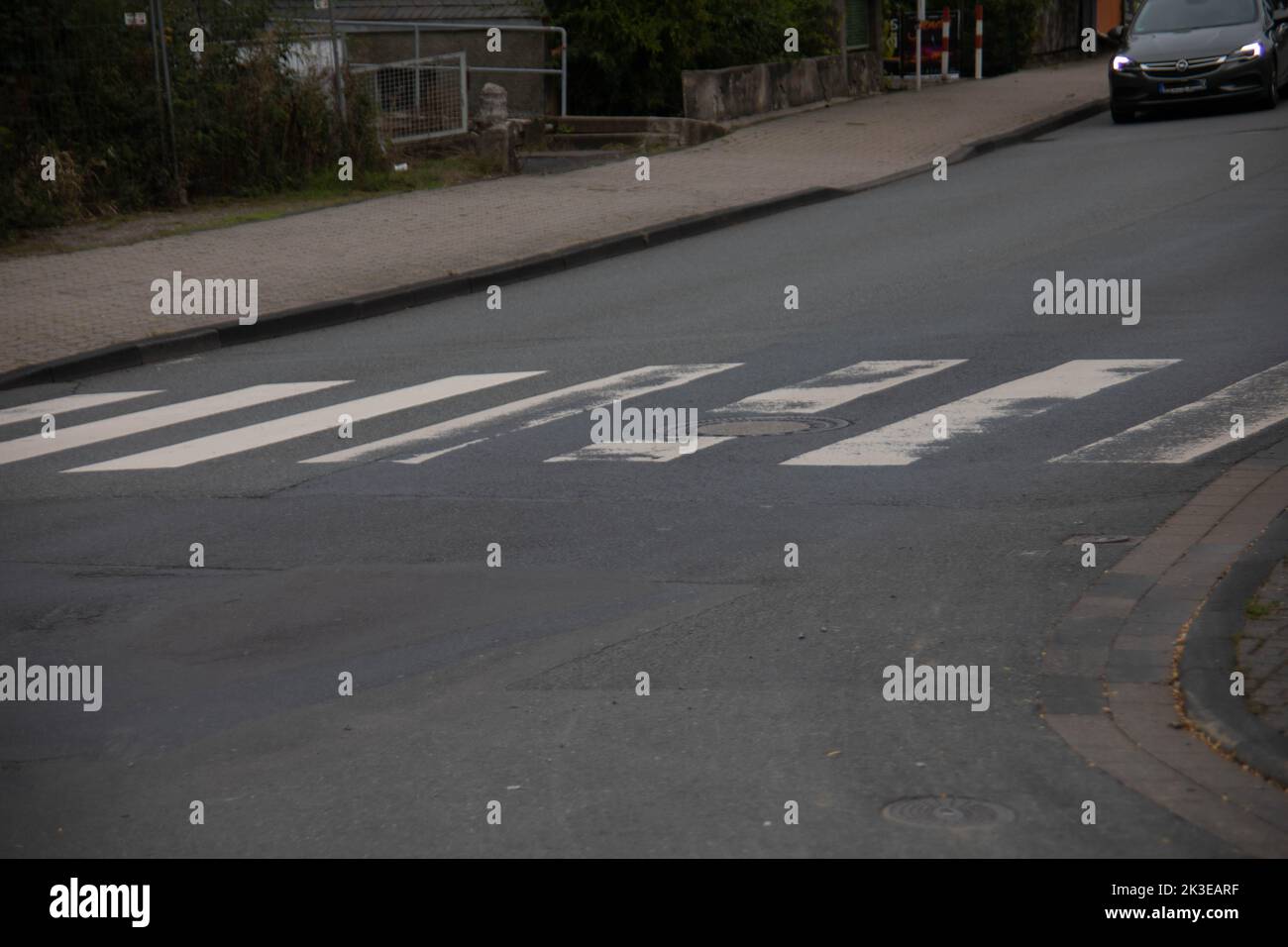 Zebra crossing as a pedestrian crossing in traffic Stock Photo