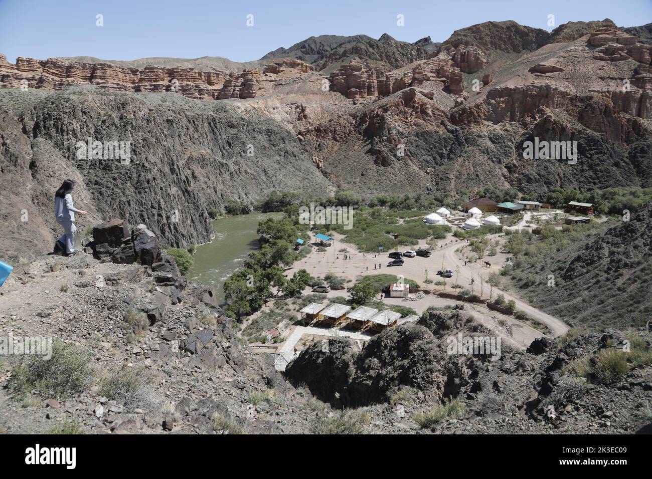View on base camp with yurts in a valley in Charyn Canyon National Park, Kazakhstan near the river Stock Photo