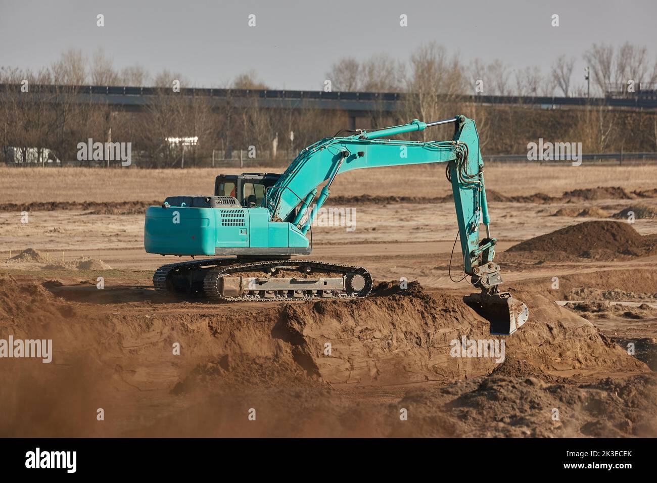 Construction site excavator and truck Stock Photo - Alamy