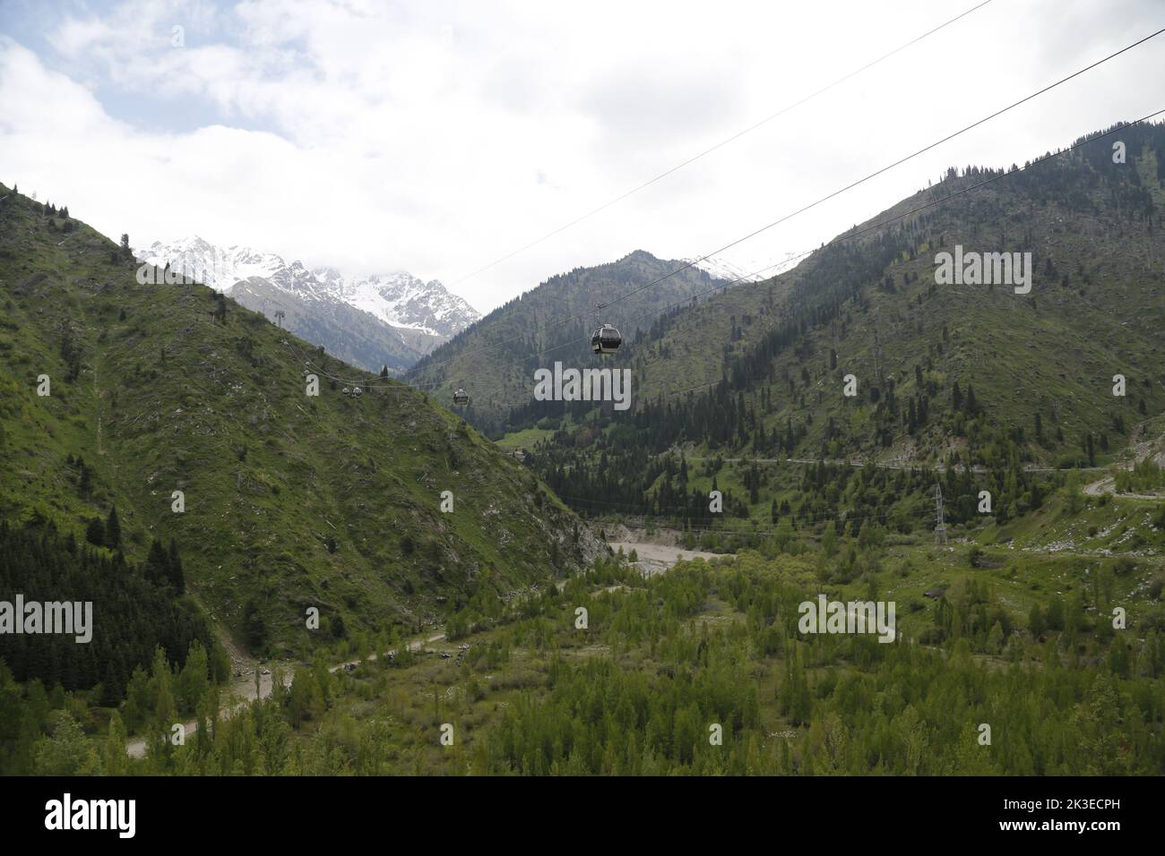 Cable car among mountains, connecting Medeu sports complex with Shymbuluk, Kazakhstan Stock Photo