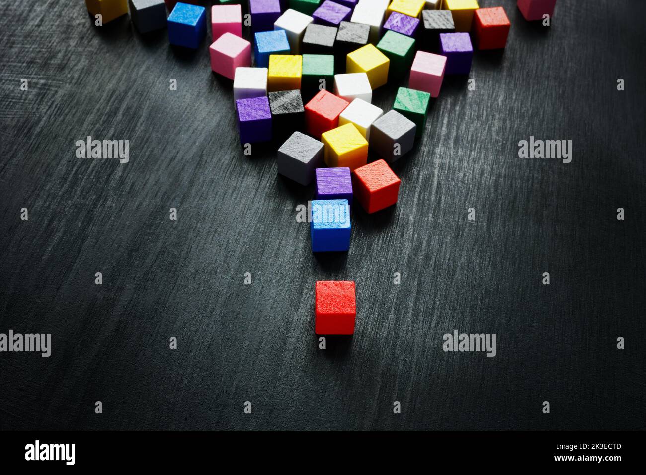 Crowd of colorful cubes and red one as a leader. Leadership concept. Stock Photo