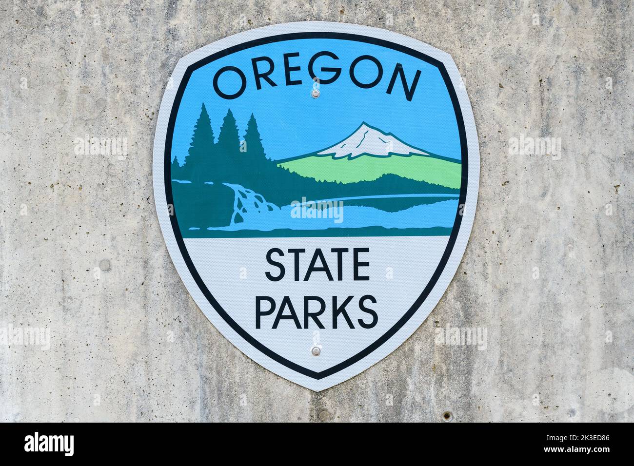 Brookings, OR, USA - September 17, 2022; Sign in closeup for Oregon State Parks on smooth concrete wall Stock Photo