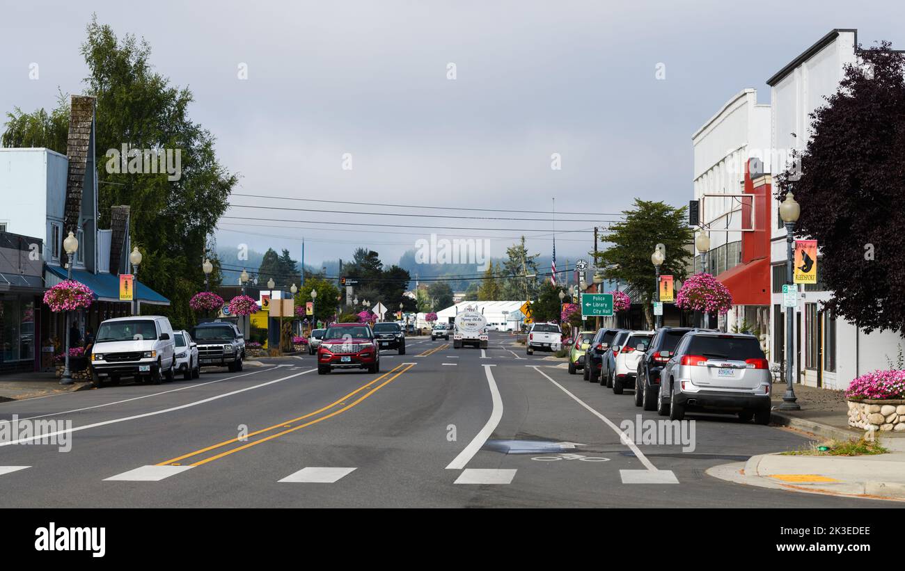 Reedsport, OR, USA - September 16, 2022; Traffic travelling along Fir Avenue in downtown Reedsport Oregon Stock Photo