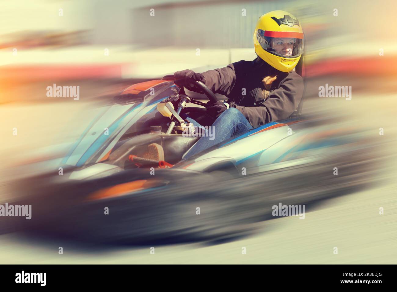 Female go-cart racer at kart circuit outdoors Stock Photo - Alamy
