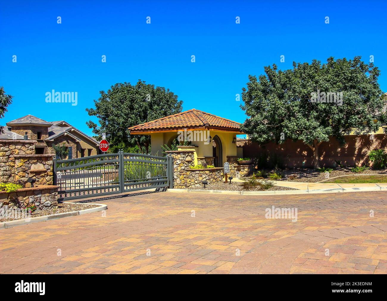 Visual Reference: Moodern Entry Gate To Secure Housing Subdivision Stock Photo