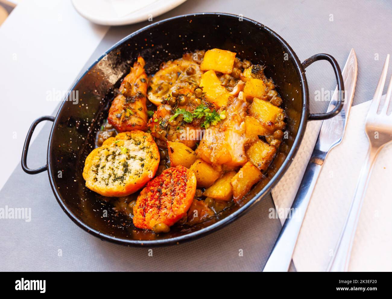 Fried monkfish with lemon Stock Photo - Alamy