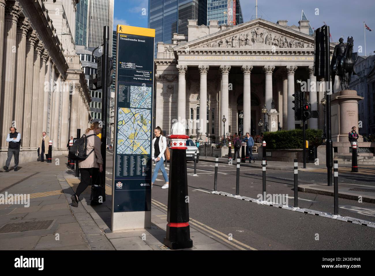 An exterior of the Bank of England (left) and Royal Exchange (right) in the aftermath of new Prime Minster, Liz Truss and her Chancellor Kwasi Kwarteng's mini-budget last Friday, the British Pound continues to fall on worldwide currency markets, now at its lowest rate since the UK went decimal in 1971, on 26th September 2022, in the City of London, England. The Bank of England has said today that it won't hesitate to raise interest rates in order to return inflation to its 2% target. Stock Photo