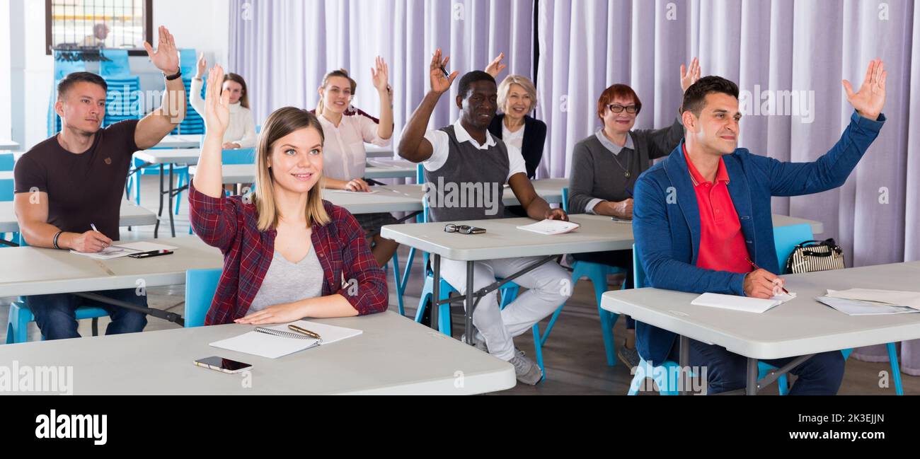 Students audience raising hands hi-res stock photography and images - Alamy