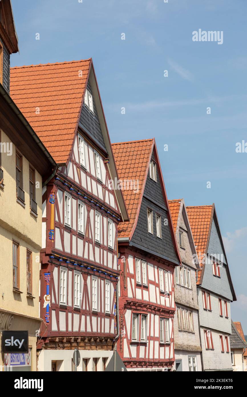 Alsfeld, Germany - June 25, 2021: famous town hall and half timbered historic houses at central square in Alsfeld, germany. Stock Photo