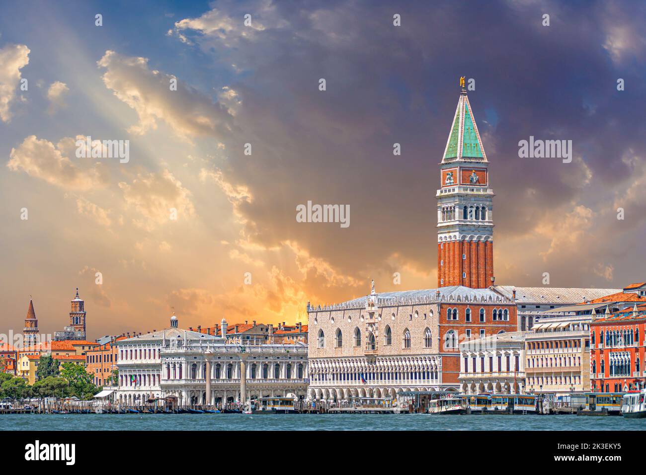 Venice, Italy - July 1, 2021: view to skyline of Venice with campanile and the doges palace under dramatic sky Stock Photo