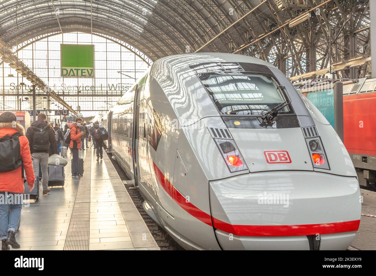 Frankfurt, Germany - December 22, 2021: people hurrying to the high speed train ICE at Frankfurt main station. Stock Photo