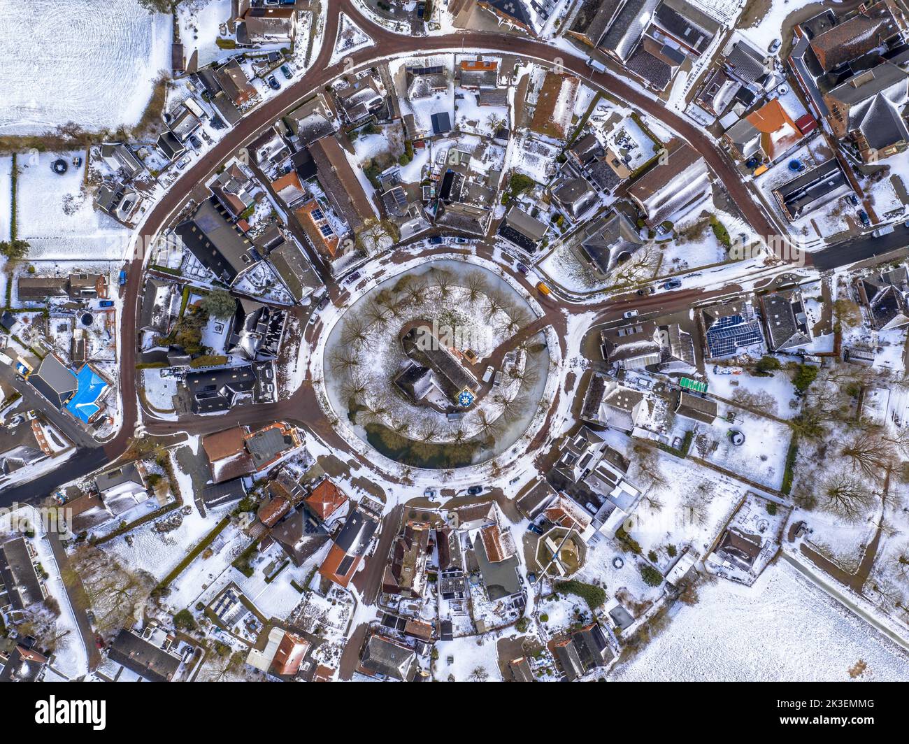 Aerial View over Village of Spijk in Winter Landscape with Snow in the Province of Groningen, the Netherlands Stock Photo