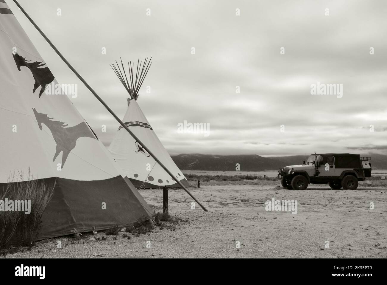 Black and White image of teepee accommodation at a desert retreat hot springs resort near Moffatt in Colorado USA Stock Photo