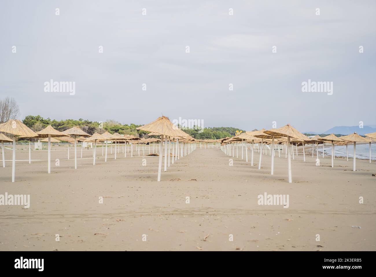 Sun umbrellas and deckchairs on the Copacabana beach, part of Great Beach Velika Plaza in Ulcinj