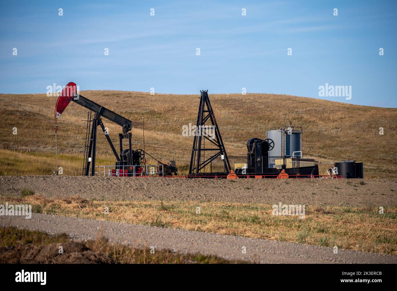 Oil well in rural Alberta Canada pumping oil and gas Stock Photo Alamy