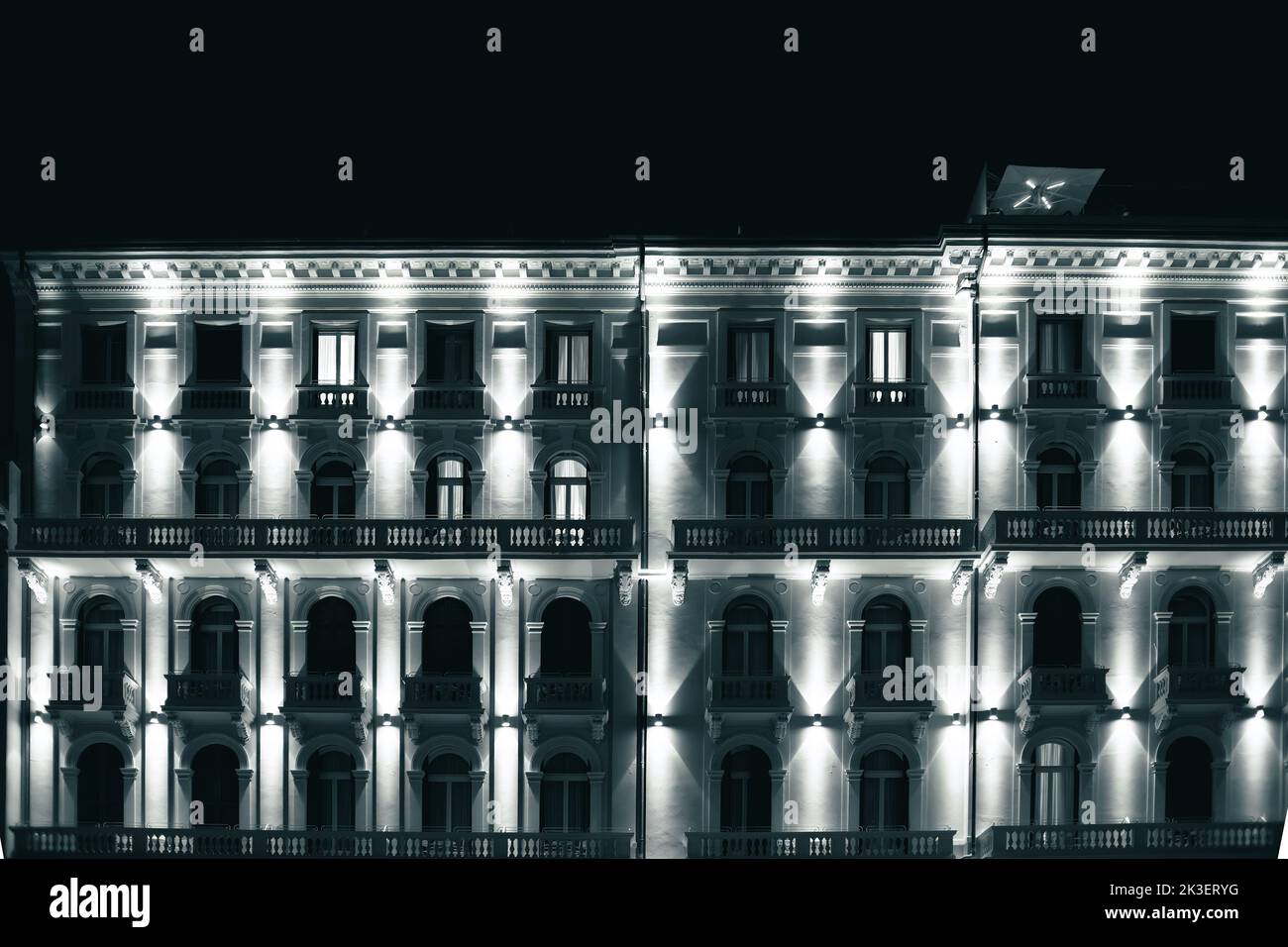 Well lit building facade at night Stock Photo