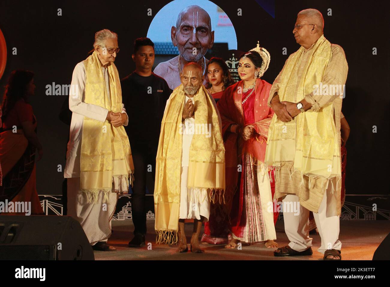 Kolkata, West Bengal, India. 25th Sep, 2022. 125-year-old yoga guru Swami Sivananda received the Bharat Dignity Awards 2022, presented by Tathagata Roy.Former Governor of Meghalaya, Indian Odissi dancer Guru Sanchita Bhattacharyaa in Kolkata. Swami Sivananda was born on August 8, 1896, according to his passport. If true, his life would have spanned three centuries, but despite his apparent age he remains strong enough to perform yoga for hours at a time. He is now applying to Guinness World Records to verify his claim. It currently lists Japan's Jiroemon Kimura, who died in June 2013 a Stock Photo