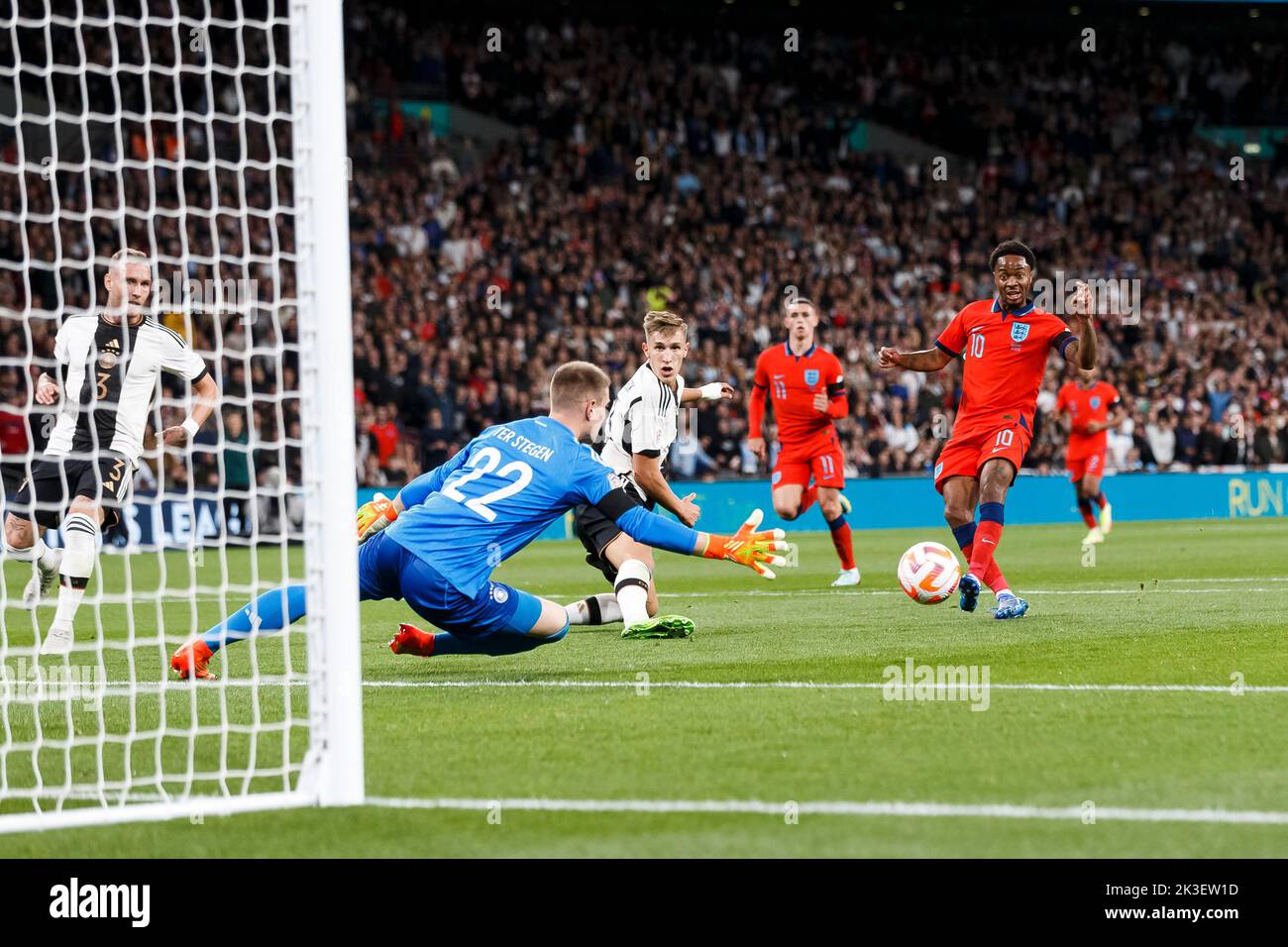 London, UK. 26th Sep, 2022. Marc-Andre ter Stegen of Germany saves from Raheem Sterling of England during the UEFA Nations League Group C match between England and Germany at Wembley Stadium on September 26th 2022 in London, England. (Photo by Daniel Chesterton/phcimages.com) Credit: PHC Images/Alamy Live News Stock Photo