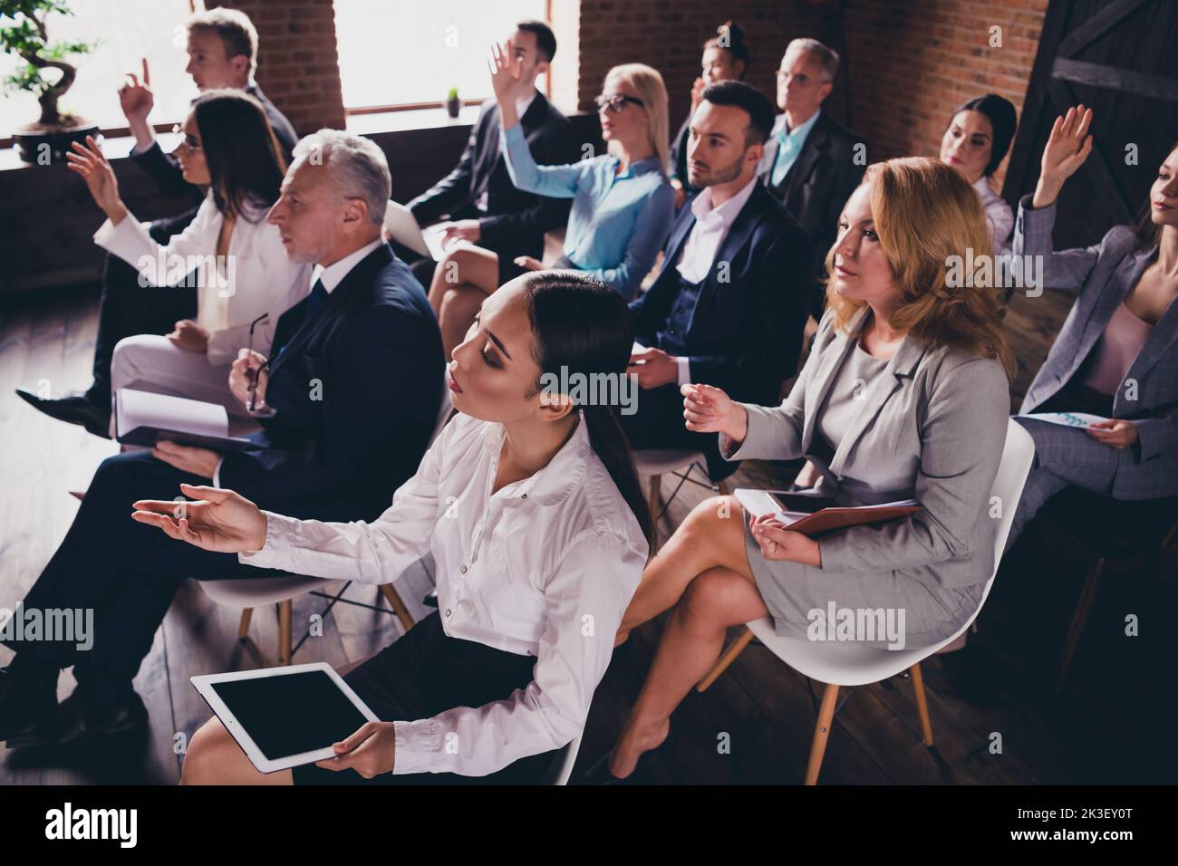 Photo of crowd business people sitting chair conference room raise arm