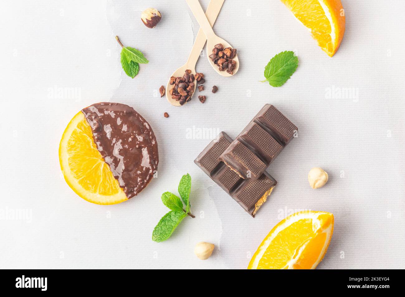 Making candied orange slices dipped in dark chocolate flatlay Stock
