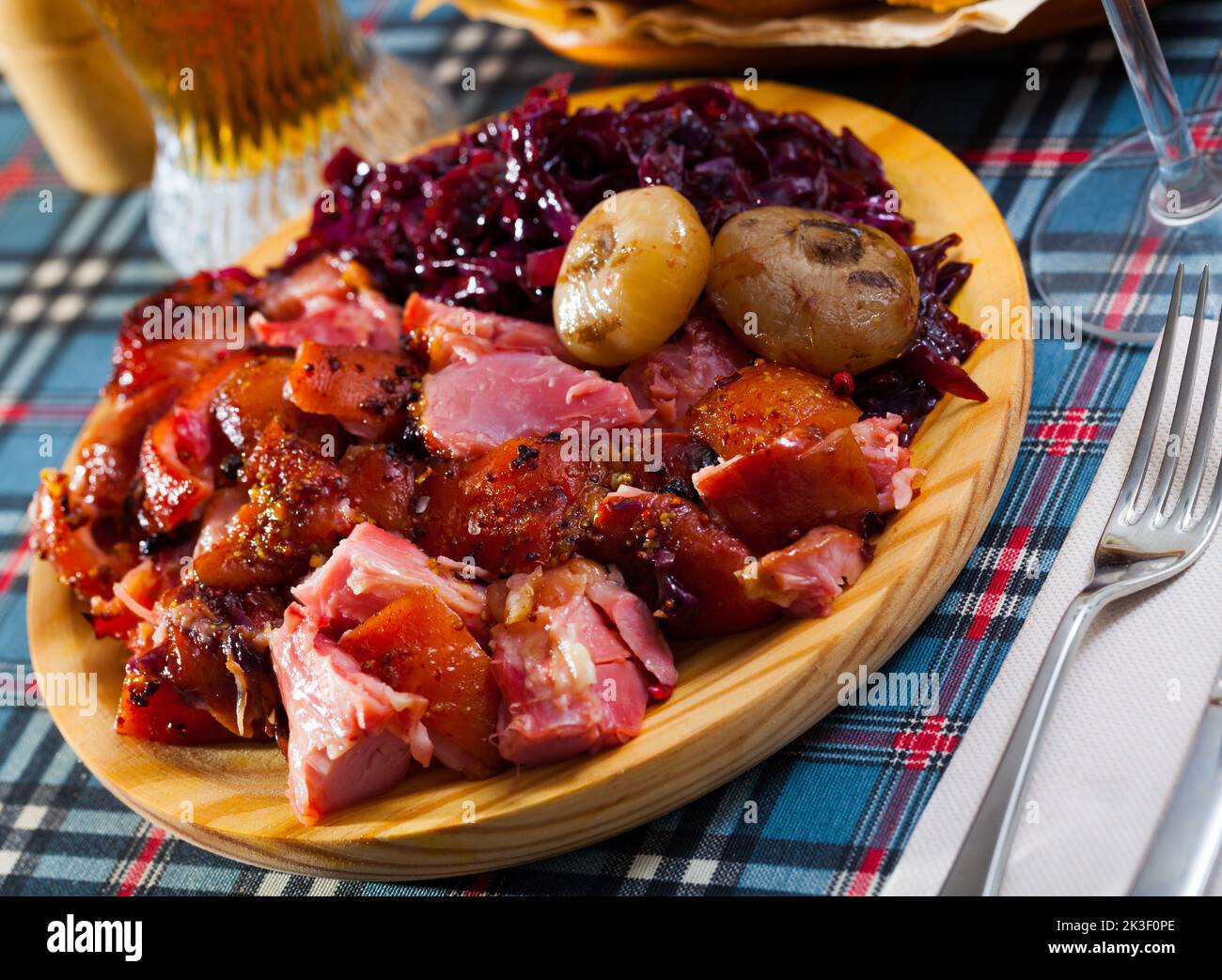 Chopped baked pork knuckle with braised cabbage Stock Photo Alamy