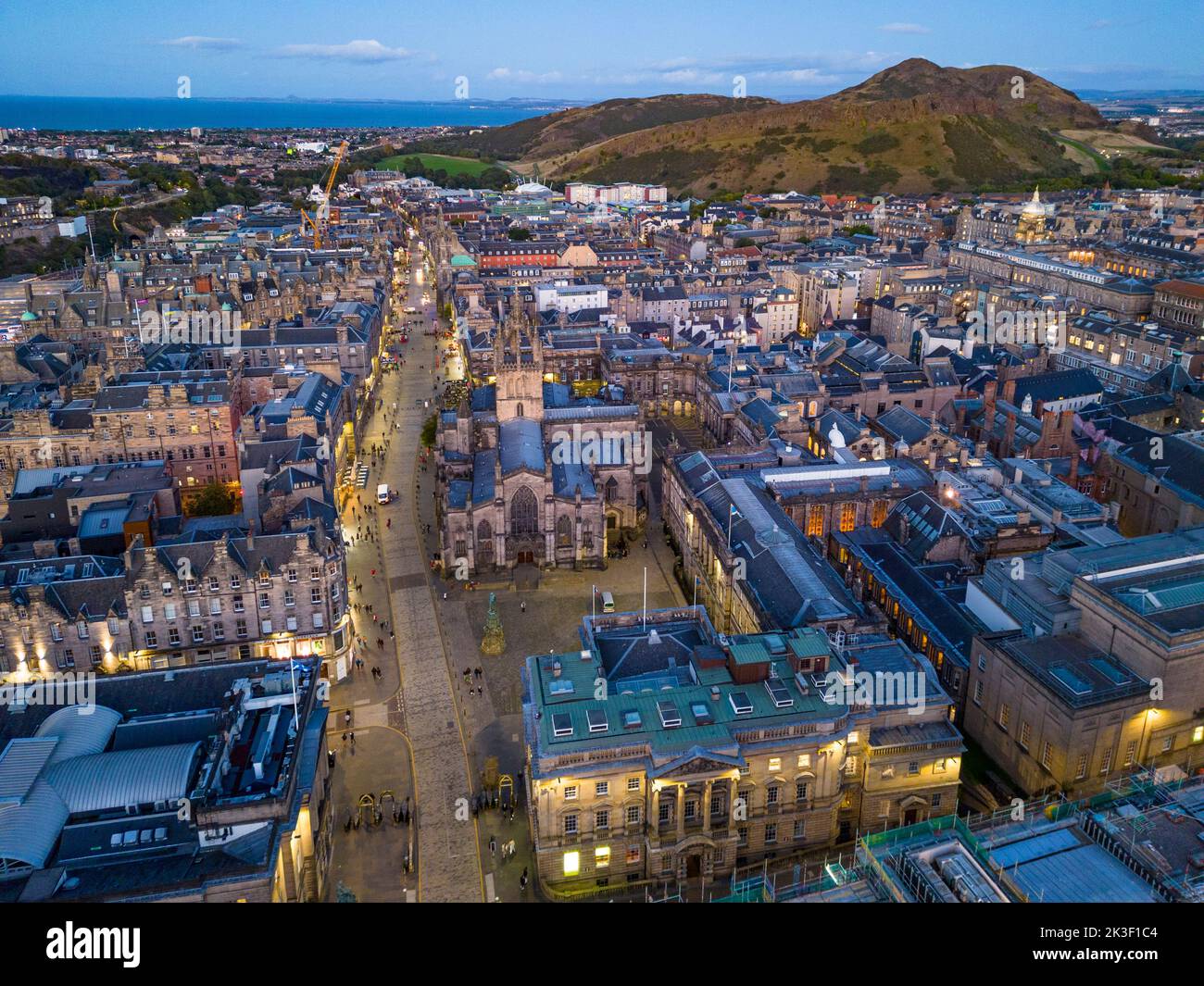 Aerial view of Royal Mile and St Giles Cathedral with skyline of Edinburgh Old Town at dusk, Scotland, UK Stock Photo