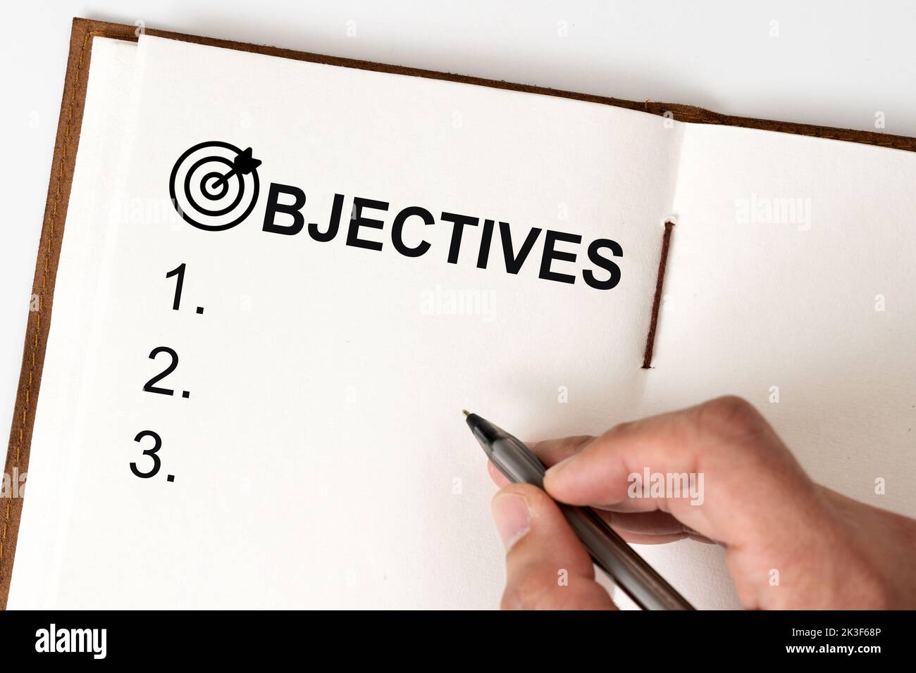 Hand writing inscription objectives Stock Photo