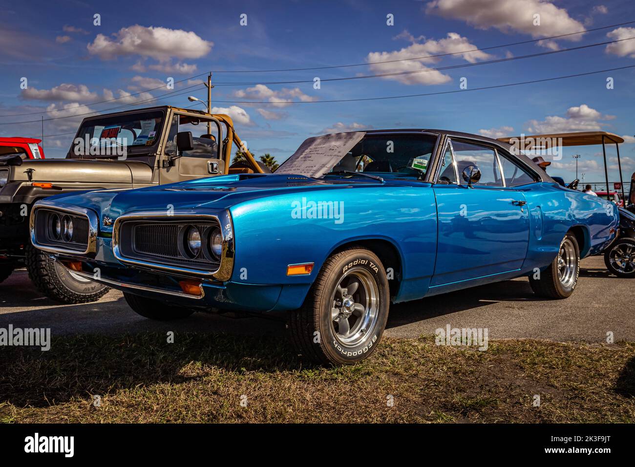 Daytona Beach, FL - November 28, 2020: Low perspective front corner view of a 1970 Dodge Coronet 440 Super Bee Hardtop Coupe at a local car show. Stock Photo